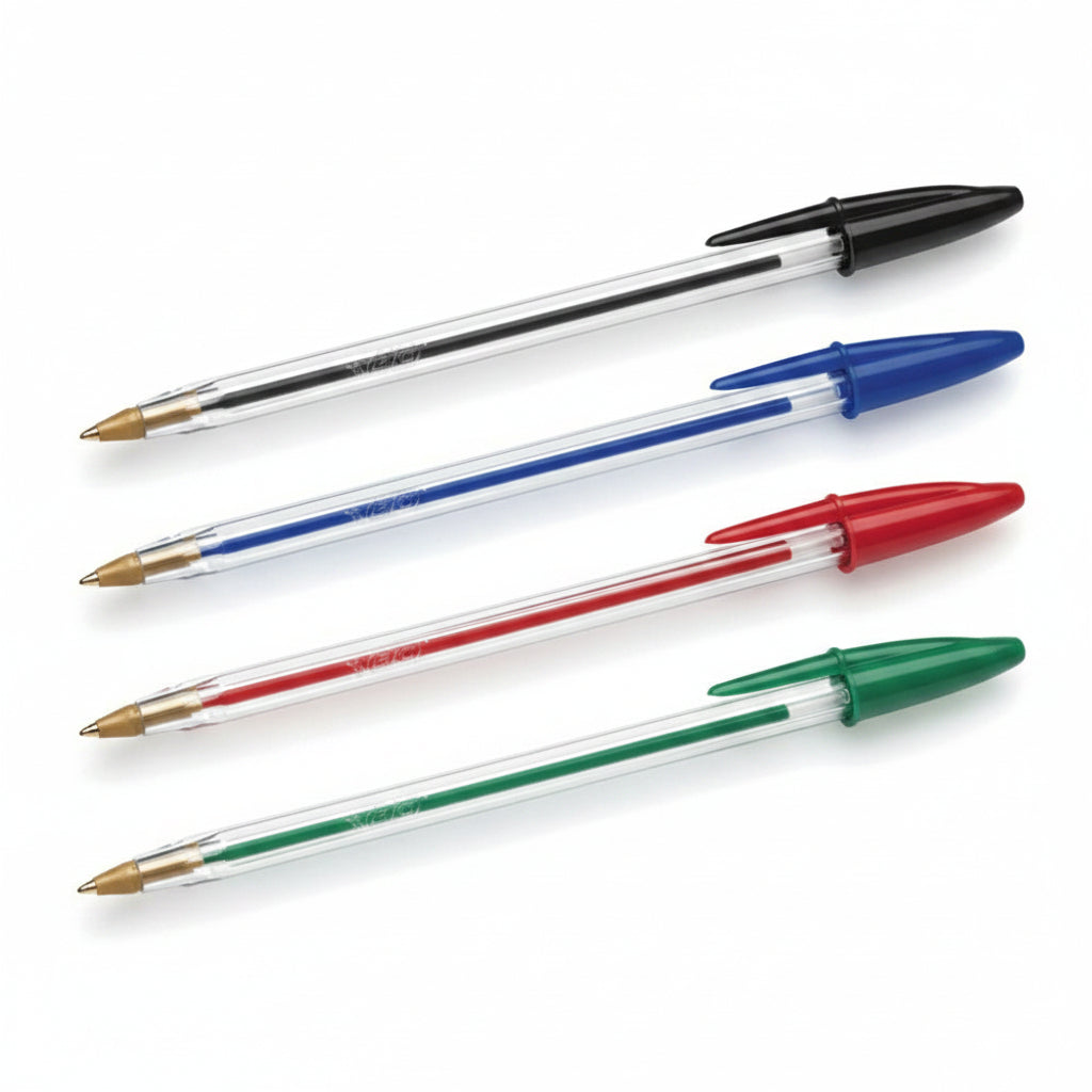 Variedad de bolígrafos BIC Cristal punto mediano 1.0 mm modelo M250 con barril hexagonal transparente, tapas ventiladas de seguridad y muestras de tinta en colores negro, azul, rojo y verde.